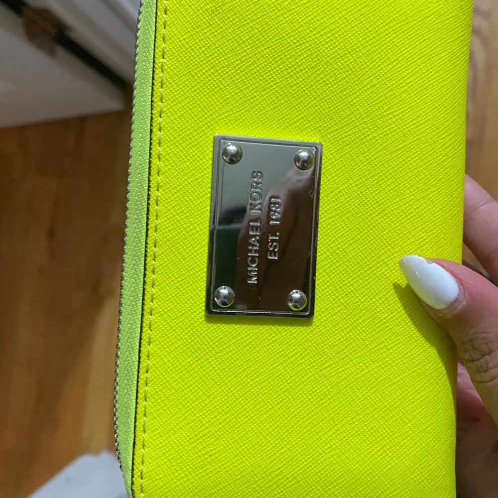 Michael Kors wristlet in neon yellow